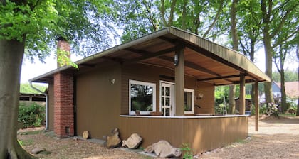 The perfect place to do nothing | A wooden house nestled between the forest and meadows