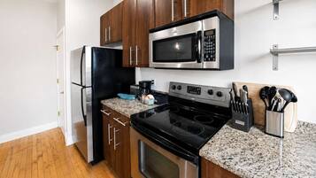 Coffee/tea maker, fridge, microwave, oven