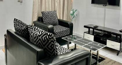 Apartment 5 minutes from Yamoussoukro stadium and university. Hotel services