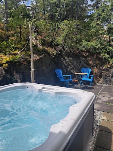 Escape to your own private suite with hot tub, comfort, nature, and relaxation
