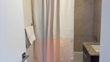 Hair dryer, towels, soap, toilet paper