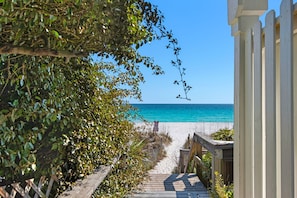 A wooden pathway leading to a beach with a clear view of the ocean. - Lakefront 4BR Home w/ Private Beach Access + Free Tix: Dolphin Cruise & More! (Destin)