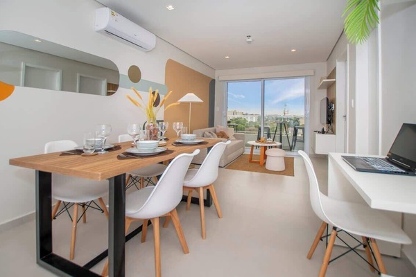 Dining and living area with workspace desk