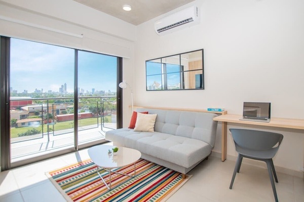 Bright living room with skyline view