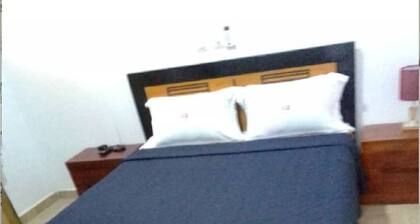5mn from Yamoussoukro stadium and university - Apartment 1 bedroom - living room
