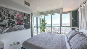 Comfort Suite, Multiple Beds, Kitchen, Lake View | Blackout curtains, iron/ironing board, free WiFi, bed sheets