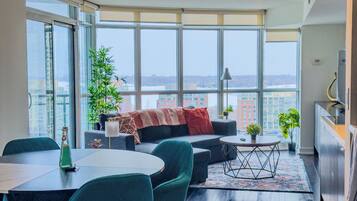 Superior Suite, 2 Bedrooms, 2 Bathrooms, Lake View | Living area | 50-inch Smart TV with digital channels, Netflix, Hulu