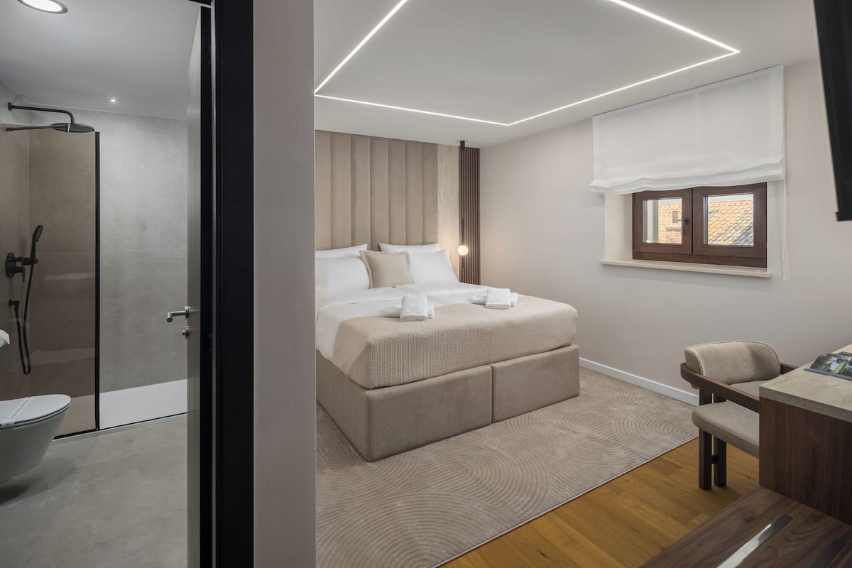 Habitación Deluxe con 2 camas individuales | Minibar, insonorización, cunas gratuitas y wifi gratis 