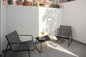 Habitación superior con 2 camas individuales | Terraza o patio
