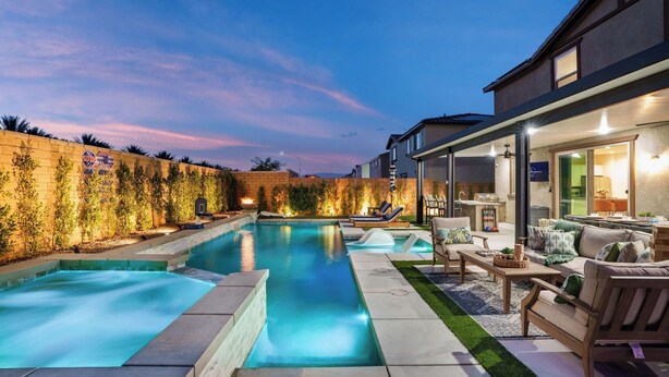 A swimming pool with a sunken area, a patio with outdoor furniture, and a covered area with a grill. - La Casita Retreat Coachella by Avantstay Pool + Spa Desert Home + Putting Green + Game Room (Coachella)
