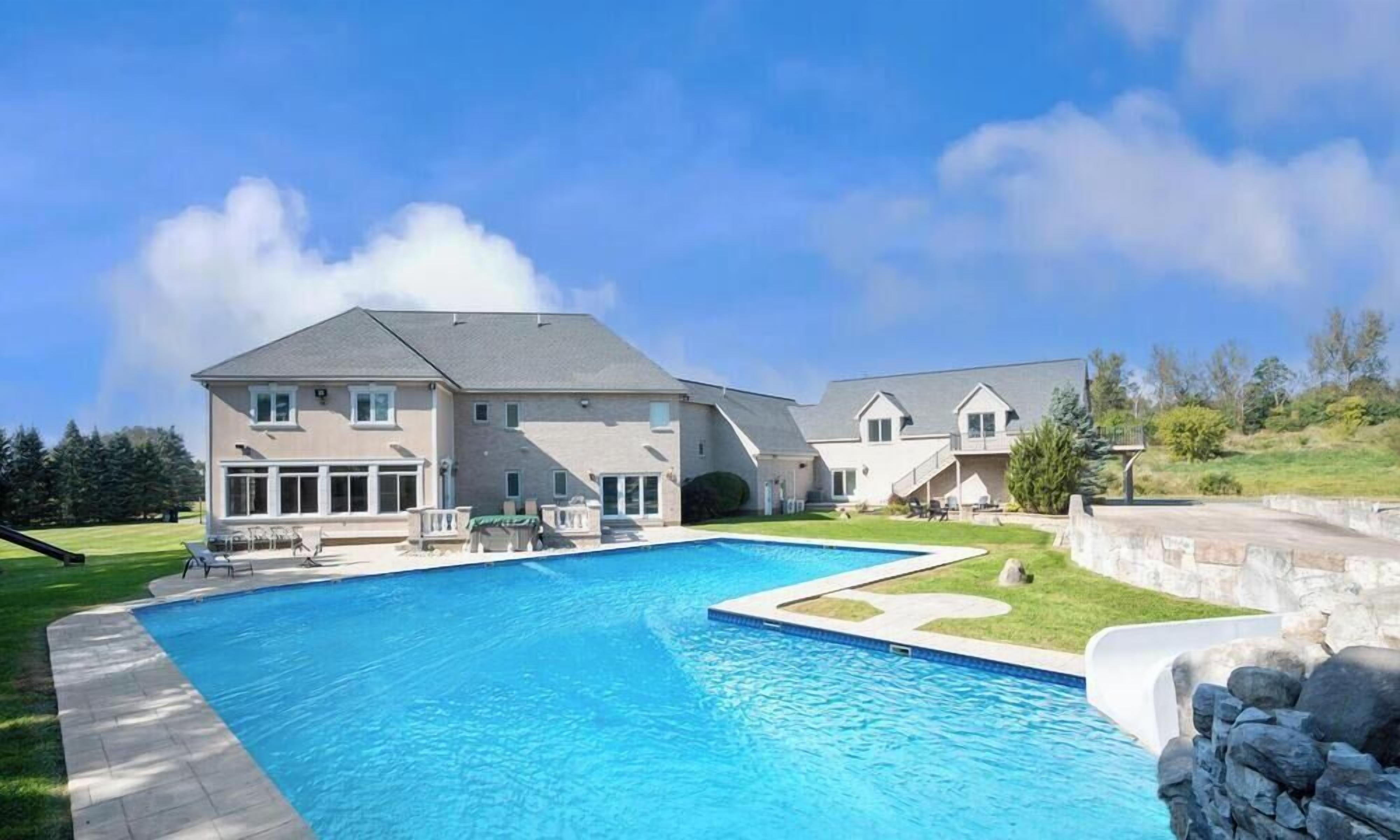 Backyard Exterior | Waterslide | In-ground pool