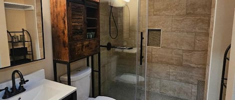 Shower, hair dryer, towels, soap