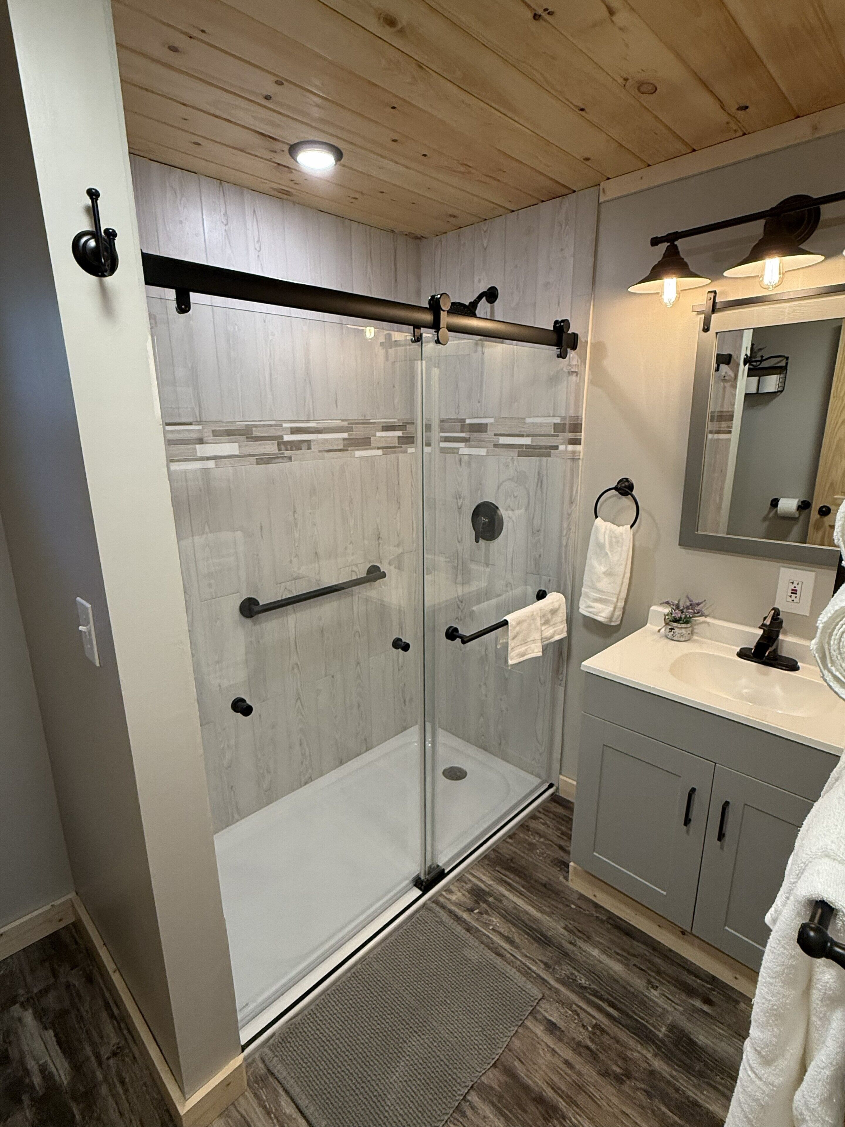 Shower, towels, soap, toilet paper