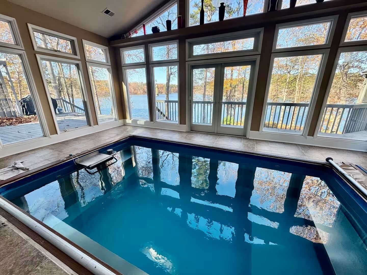 Indoor pool, climate controlled sunroom, overlooking the lake!
