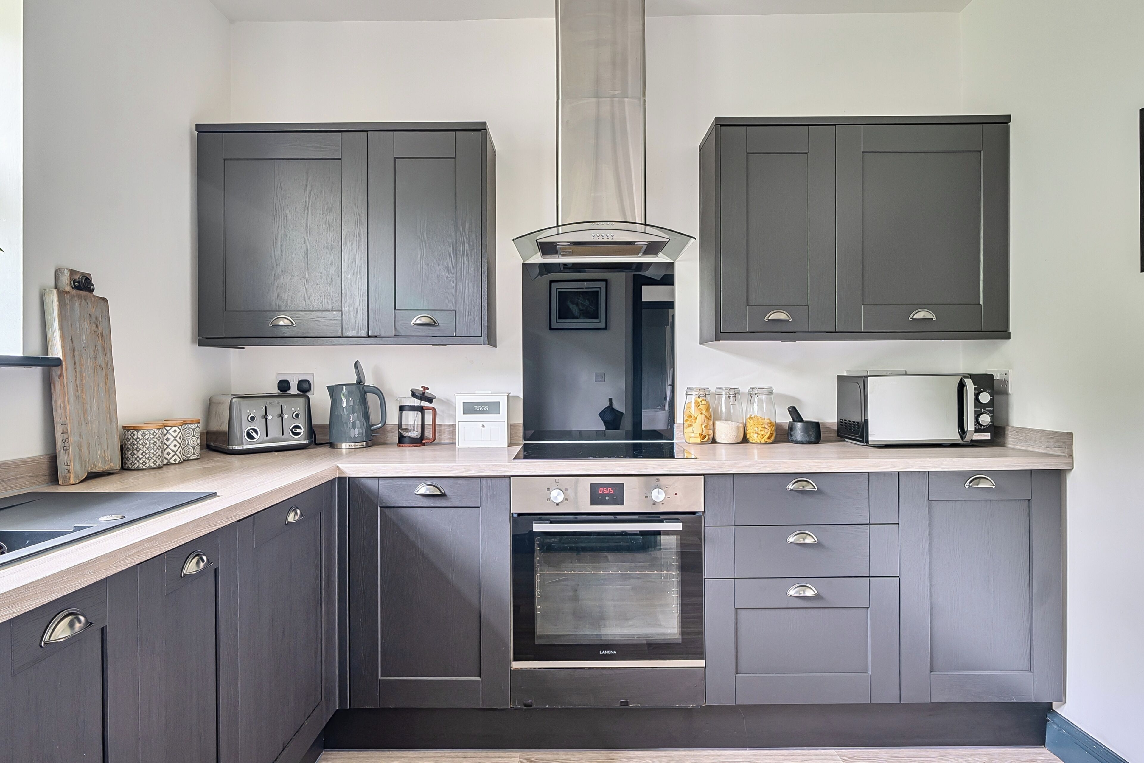 Coffee/tea maker, fridge, microwave, oven