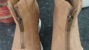 A pair of tan suede sneakers with white soles and metal zippers. - Reasonable rates (Stellarton)