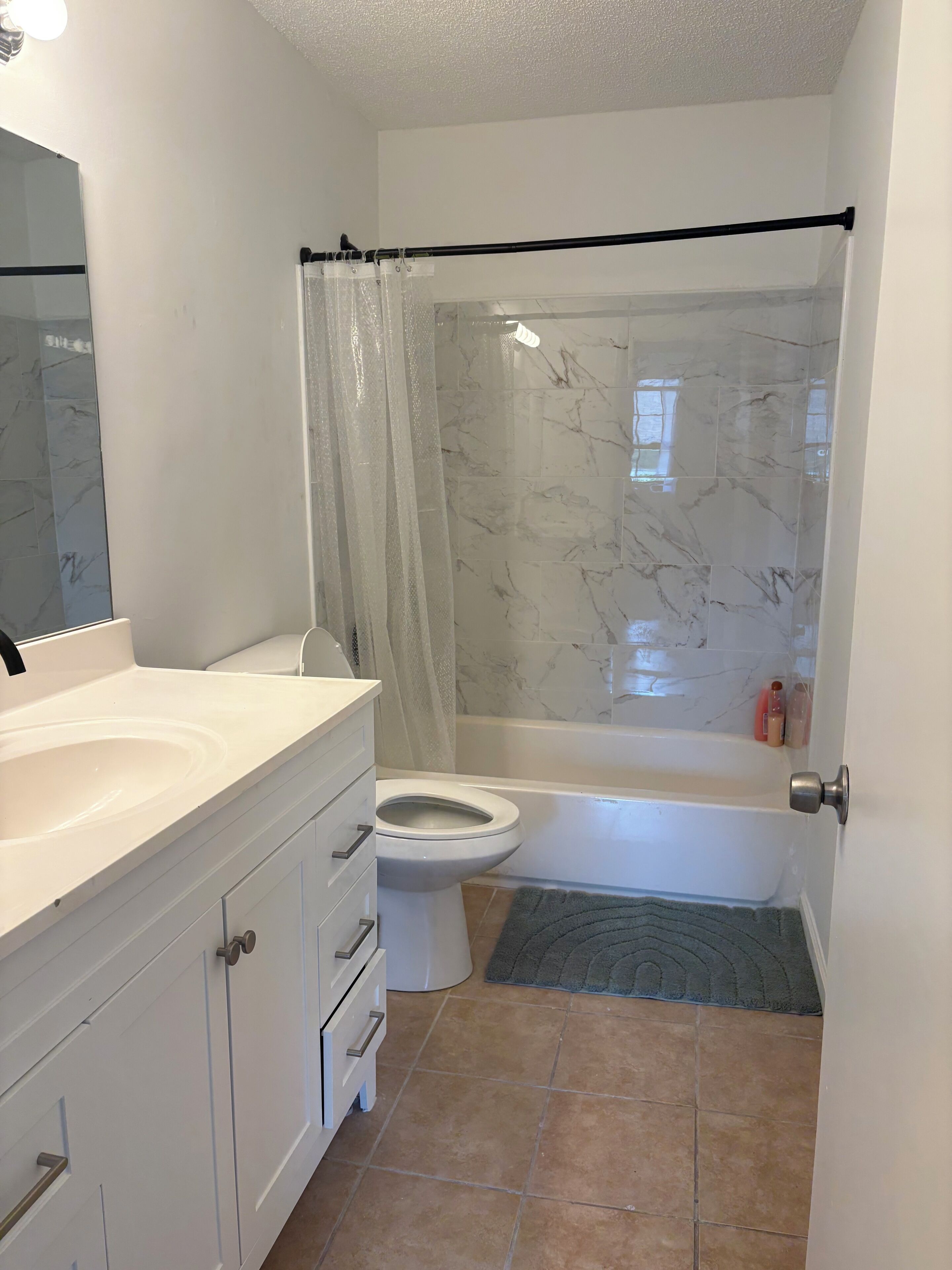 Hair dryer, towels, soap, toilet paper