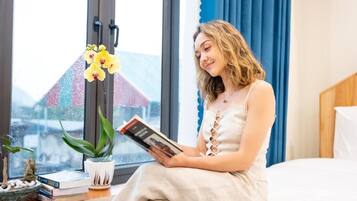 Deluxe Triple Room, Balcony, City View | Desk, blackout drapes, soundproofing, free WiFi