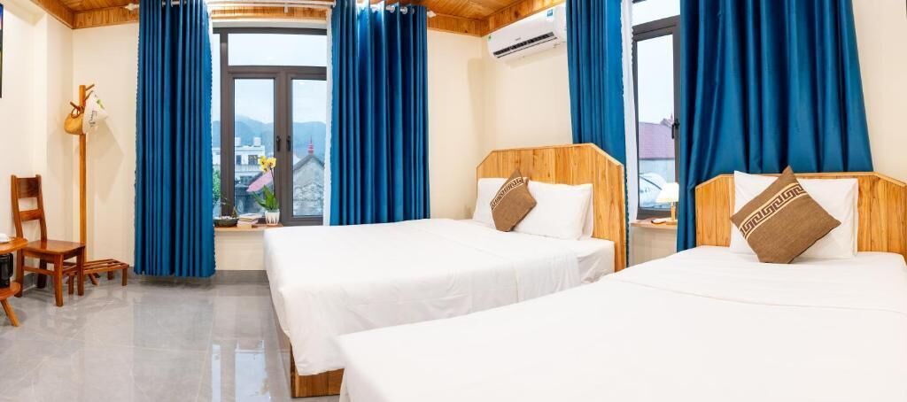 Deluxe Triple Room, Balcony, City View | Desk, blackout drapes, soundproofing, free WiFi