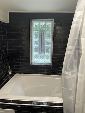 Jetted bath, towels, soap, toilet paper - Beltline Suite w/ Adjustable Bed – 1.5 miles from ATL Benz Stadium (Atlanta)