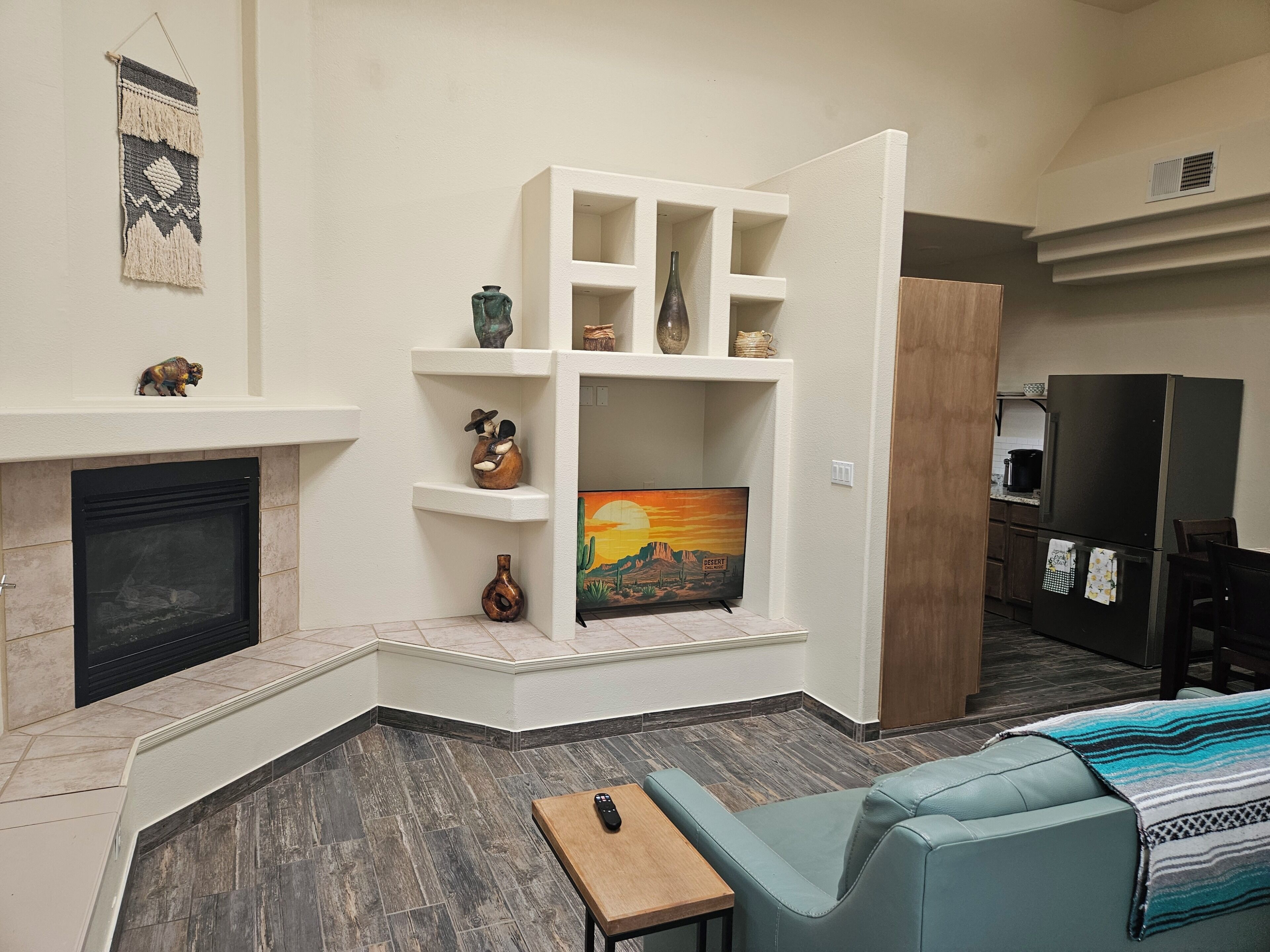 Smart TV, fireplace, books