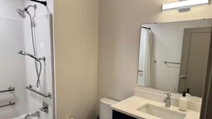 Hair dryer, towels, soap, toilet paper - Brick & Bed - Stunning Riverfront Loft, 505 (St. Louis)