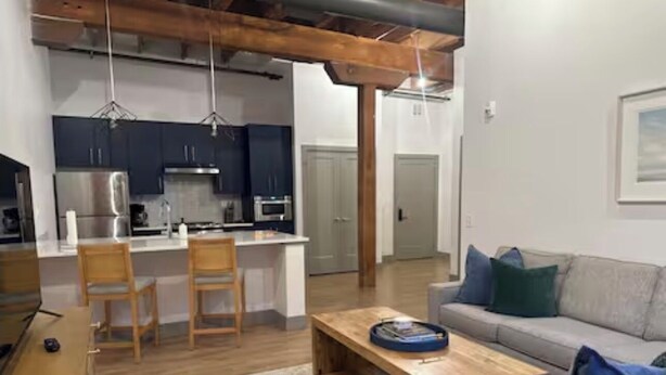 Living area - Brick & Bed - Stunning Riverfront Loft, 505 (St. Louis)