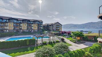 Seasonal outdoor pool, pool umbrellas, pool loungers