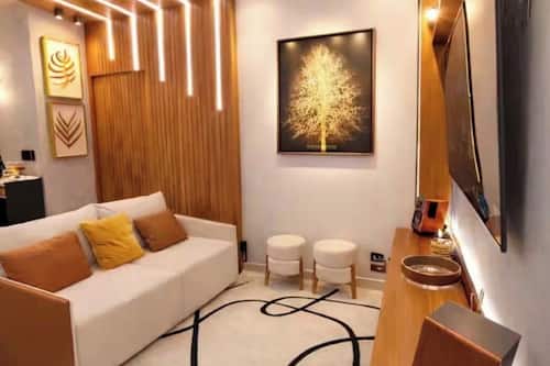 Apartamento luxo, ar-condicionado, vista parcial para o lago | Área de estar
