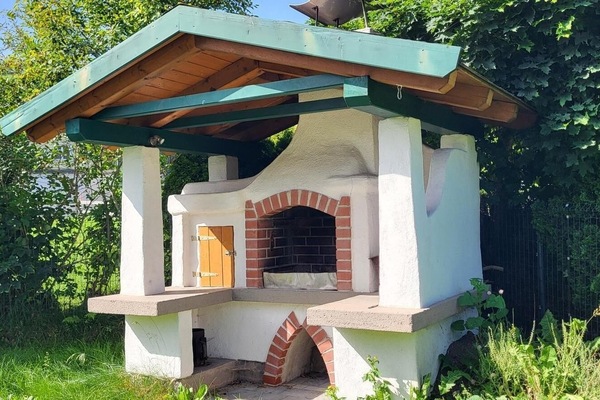 Outdoor area with a large barbecue