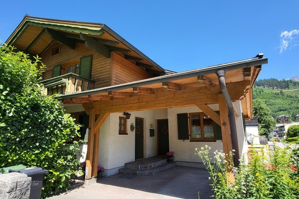 Main view of the building in summer