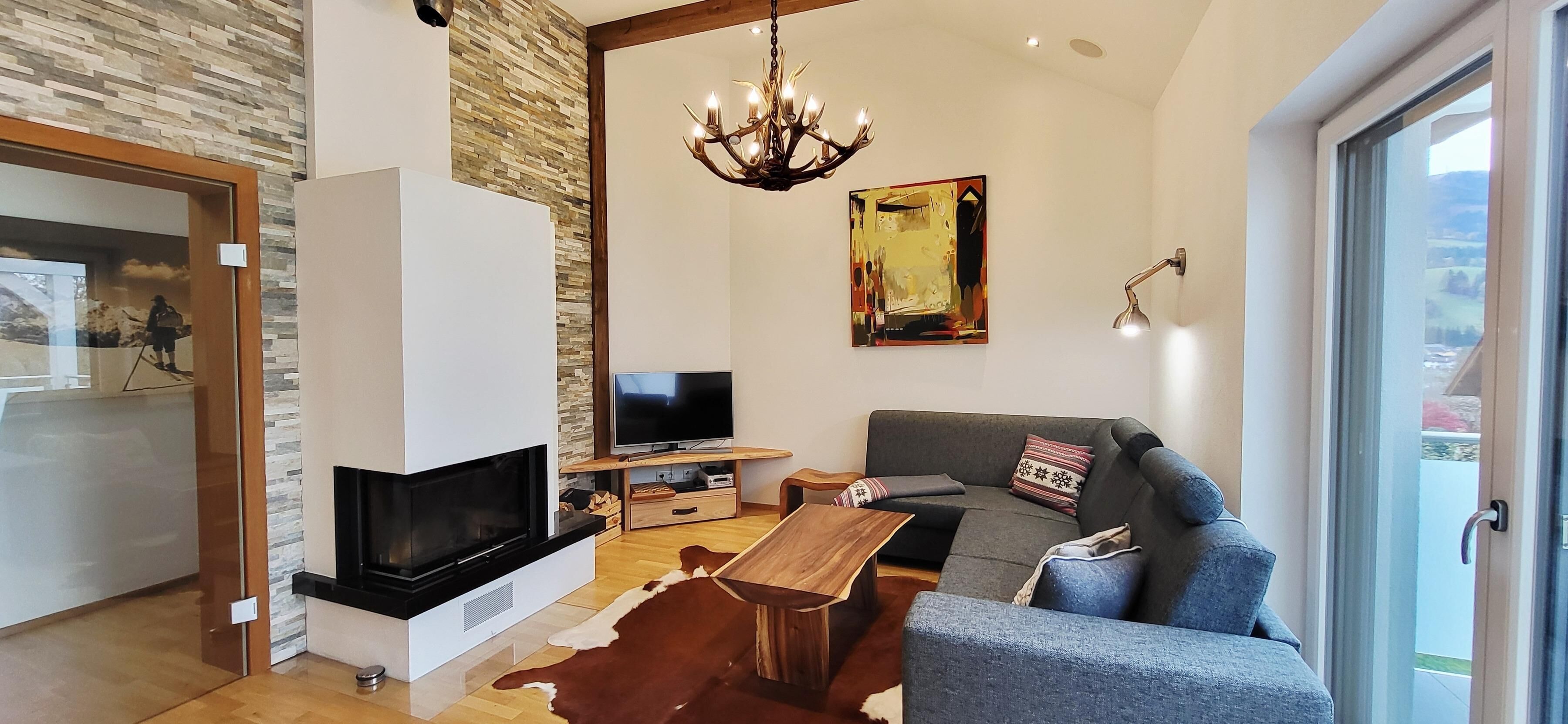 Living room with a sofa and a TV