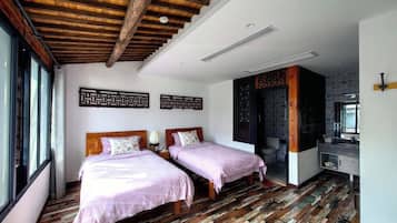 Premium bedding, down comforters, individually decorated
