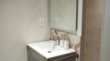 Hair dryer, towels, soap, toilet paper