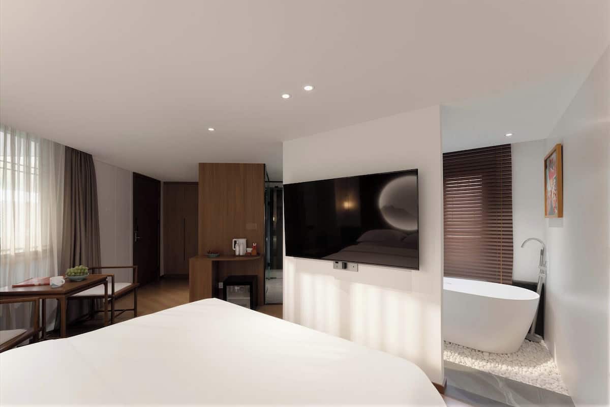Ropa de cama de alta calidad, minibar y escritorio 