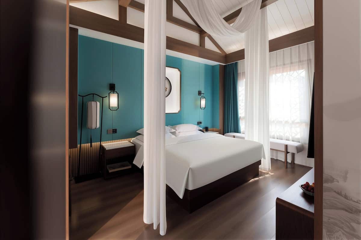 Ropa de cama de alta calidad, minibar y escritorio 