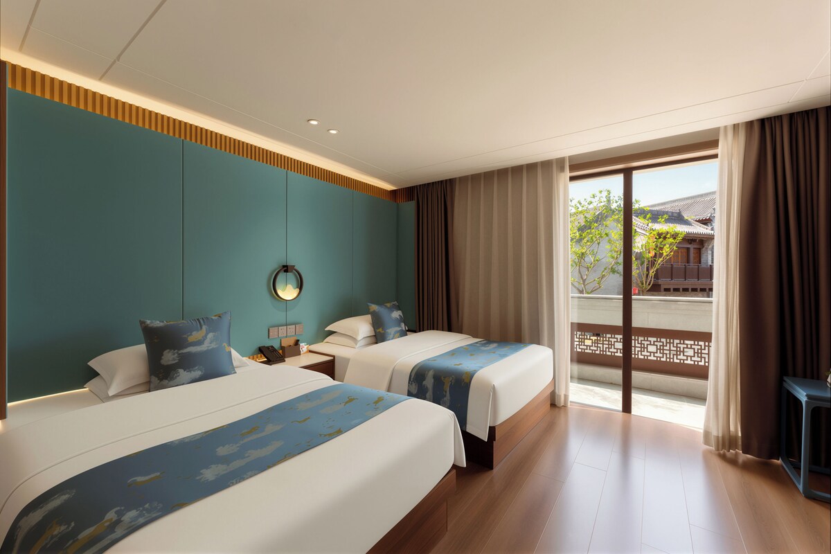 Habitación básica doble | Ropa de cama de alta calidad, minibar, escritorio