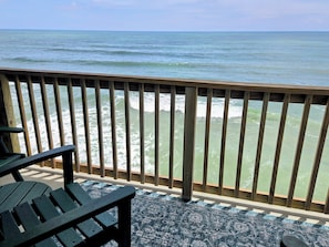 A wooden deck with a view of the ocean. - Ocean Front Condo 376 directly on the beach (North Topsail Beach)