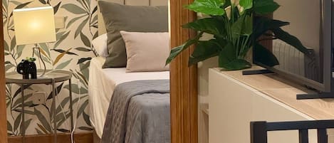 1 dormitorio, tabla de planchar con plancha, wifi gratis y ropa de cama