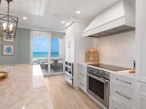 Coffee/tea maker, fridge, microwave, oven - Beachfront 3BR/3BA condo with pool, WiFi, and heated outdoor pool. (Marco Island)