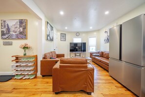 Living area - Bright & Stylish 4BR House • Boston Getaway w/ Free Parking & Pet-Friendly 27 (Boston)