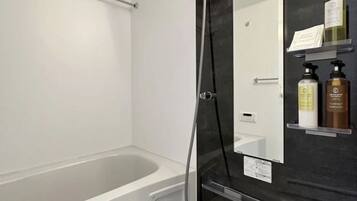 Bathroom | Separate tub and shower, hair dryer, towels, soap