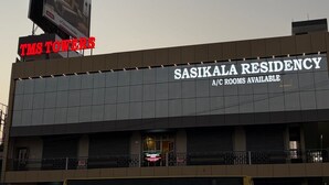 A building with a sign for 'SASIKALA RESIDENCY' and 'A/C ROOMS AVAILABLE'. - Sasikala Residency  (Madurantakam)