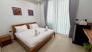 Deluxe Double Room, Partial Ocean View | Blackout curtains, soundproofing, free WiFi - SUNRIO BEACH HOTEL SICHON (Tambon Thung Prang)