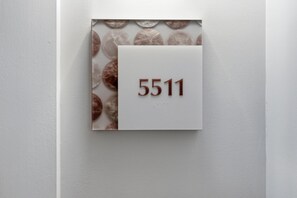A white wall with a number plaque displaying '5511'. - Studio in Elation at Sandestin Golf and Beach Resort! (Miramar Beach)