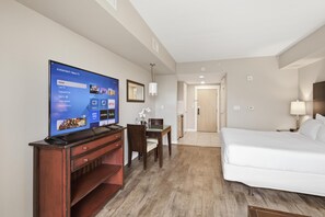 A hotel room with a TV, a bed, a desk, and a chair. - Studio in Elation at Sandestin Golf and Beach Resort! (Miramar Beach)