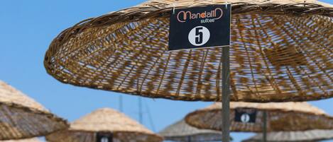 Sun-loungers, beach umbrellas