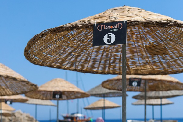 Sun loungers, beach umbrellas