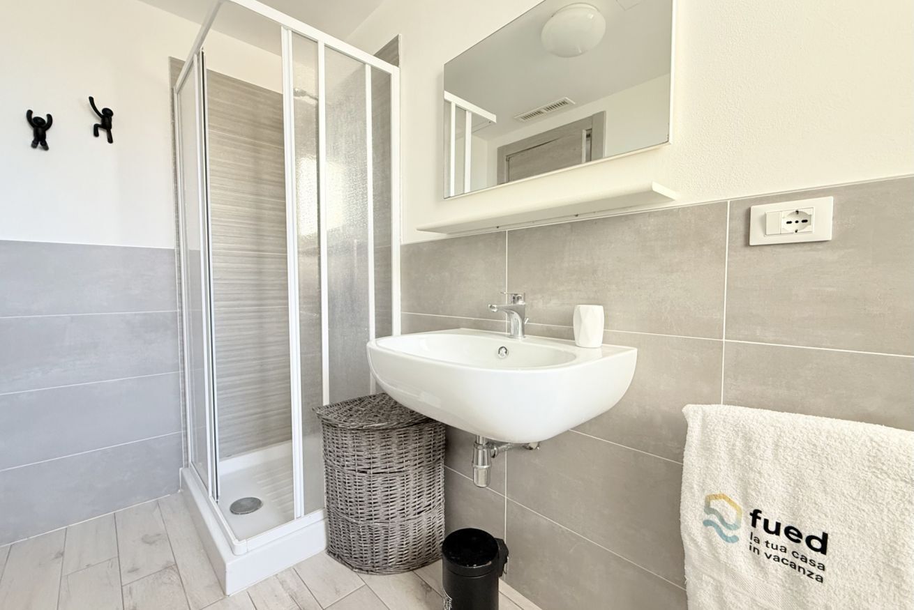 Ducha, bidet, toallas