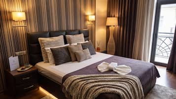 Comfort Apartment, River View | In-room safe, desk, blackout drapes, iron/ironing board